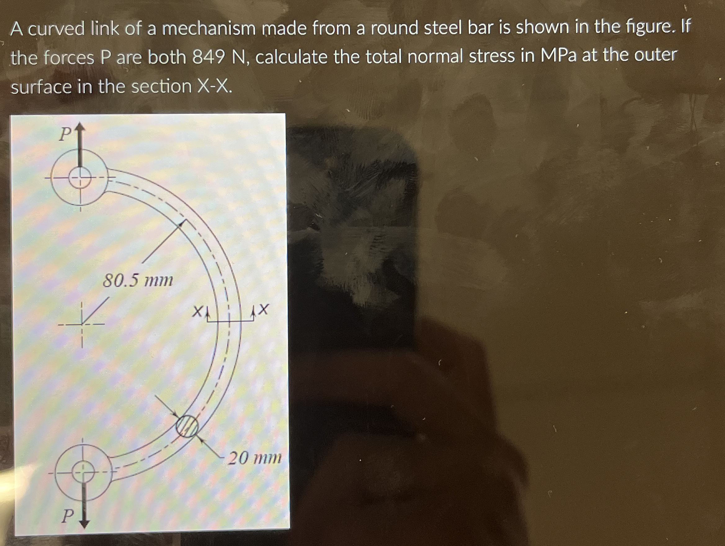A curved link of a mechanism made from a round