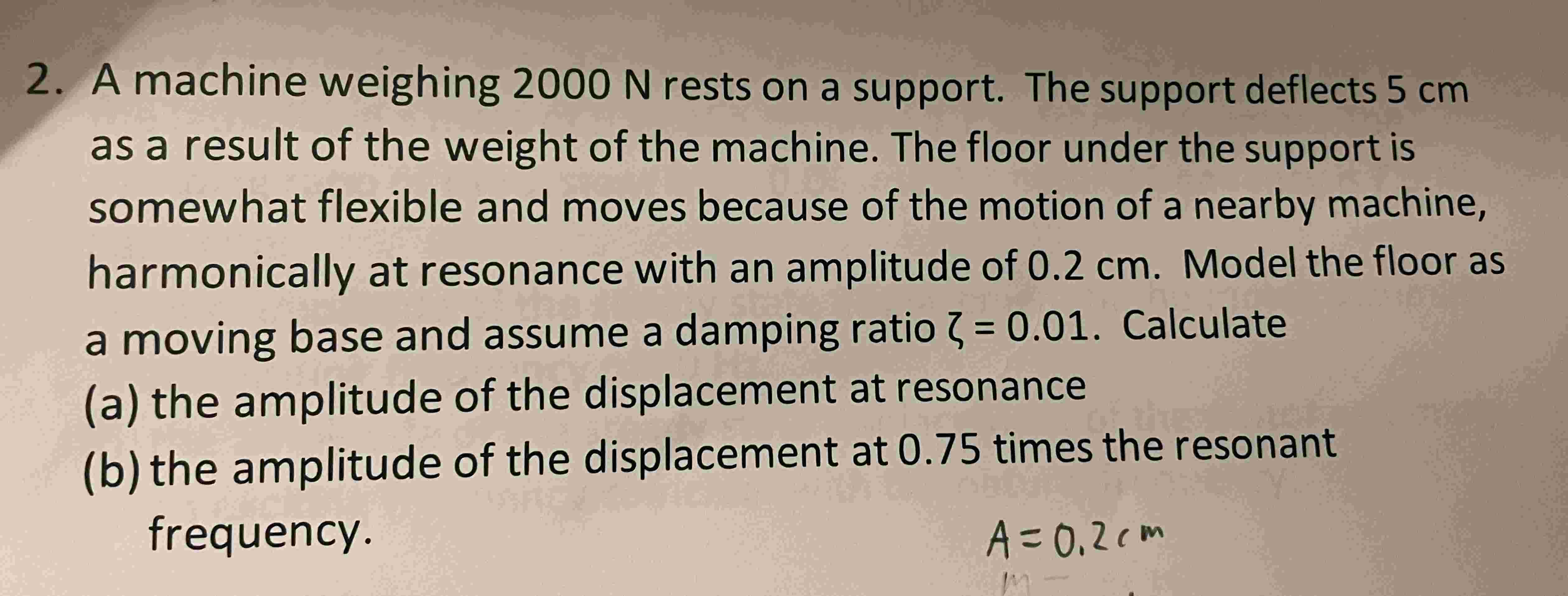 2 . A machine weighing 2 0 0 0 N rests on a