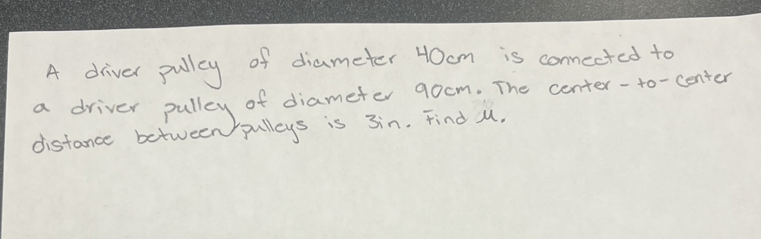 A driver pulley of diameter 4 0 cm is connected