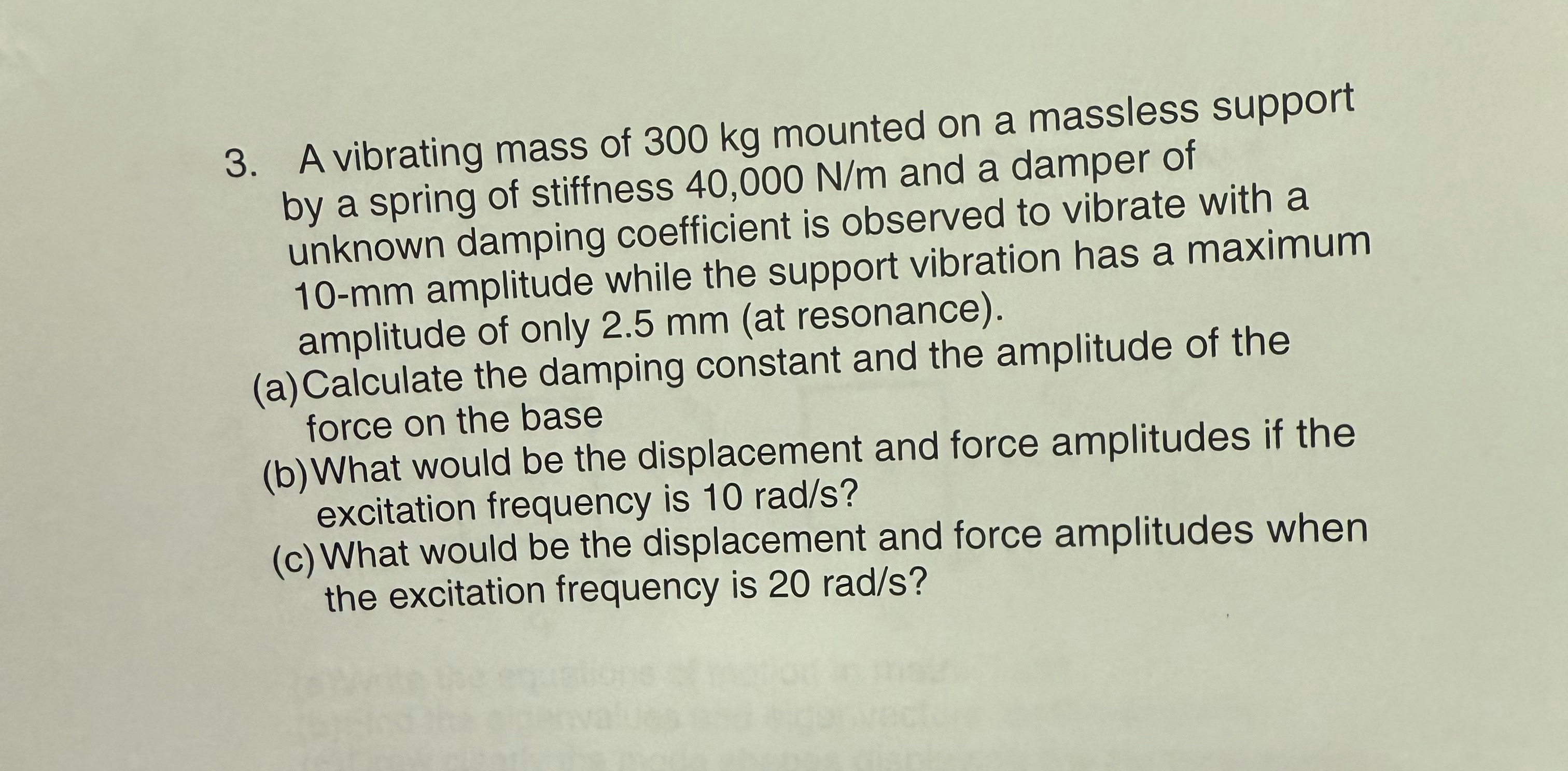A vibrating mass of 3 0 0 kg mounted on a