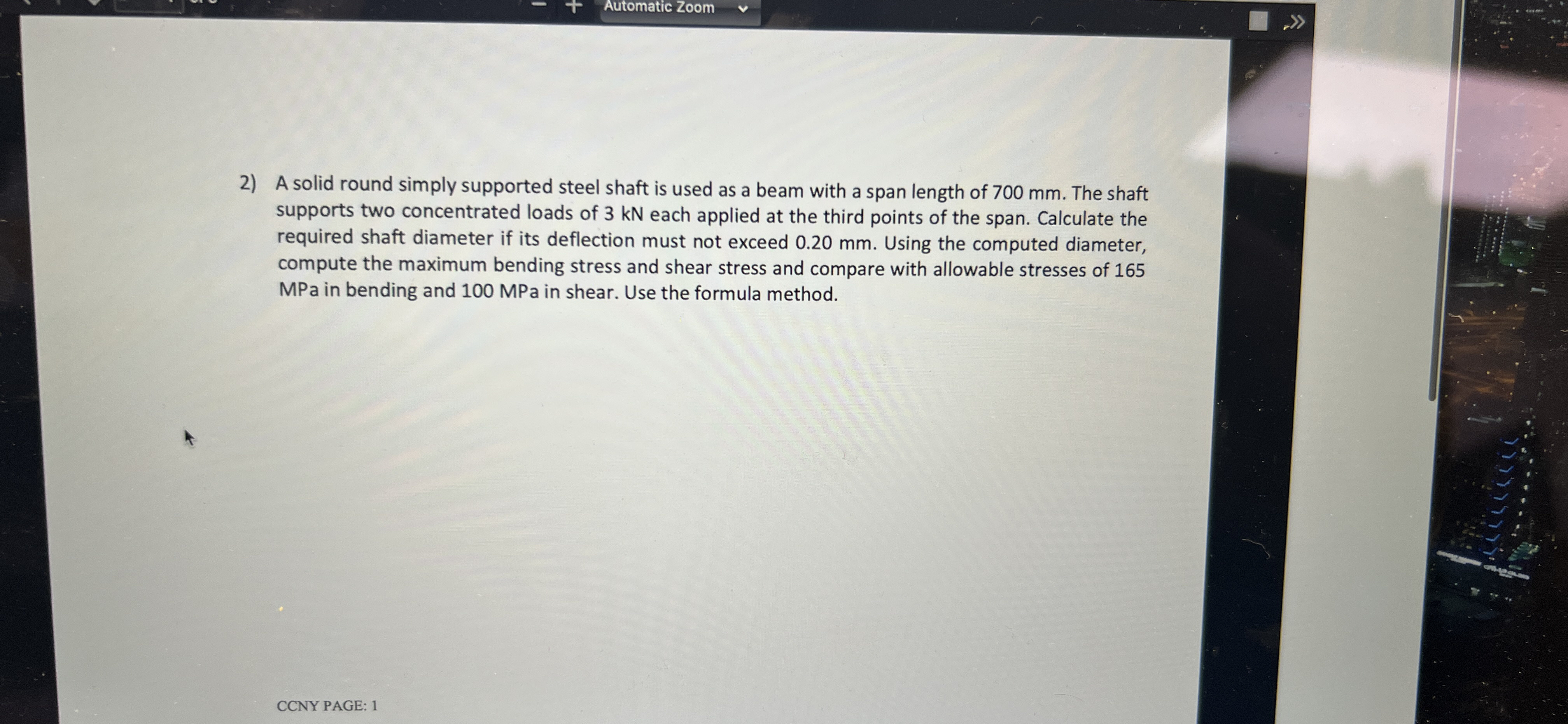 A solid round simply supported steel shaft is