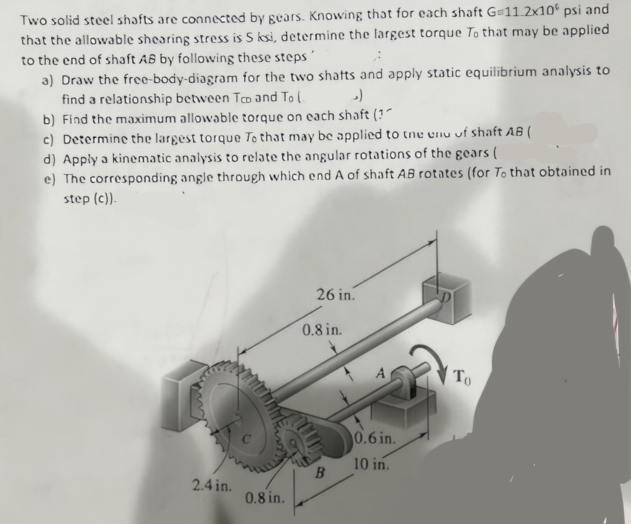 Two solid steel shafts are connected by ' Eears.