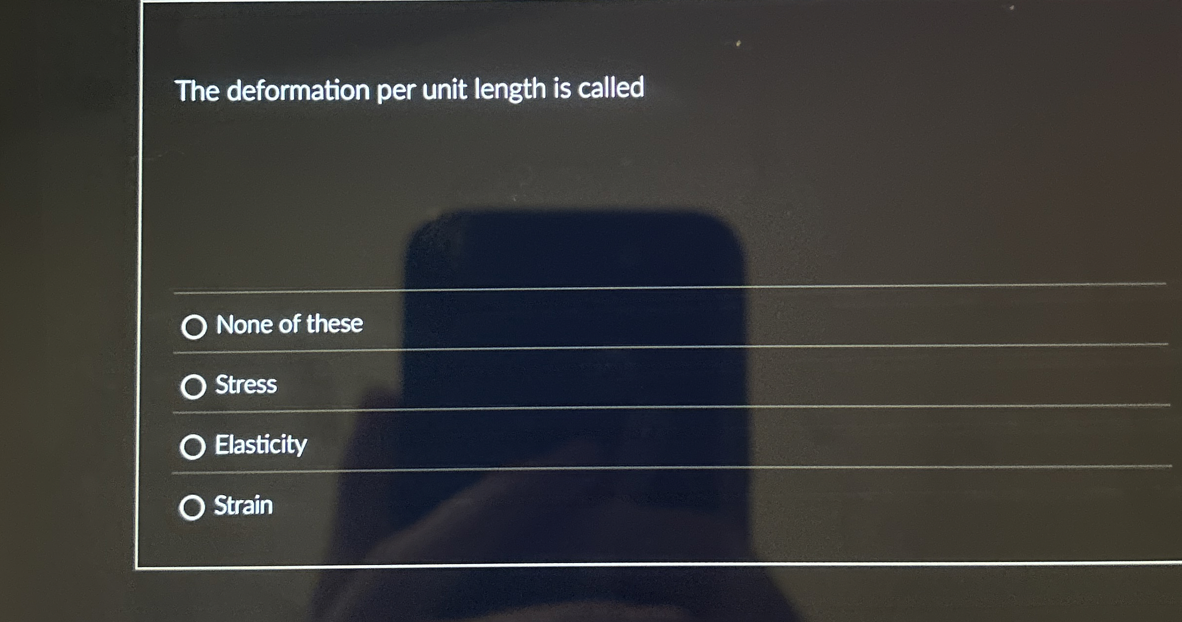 The deformation per unit length is called None of