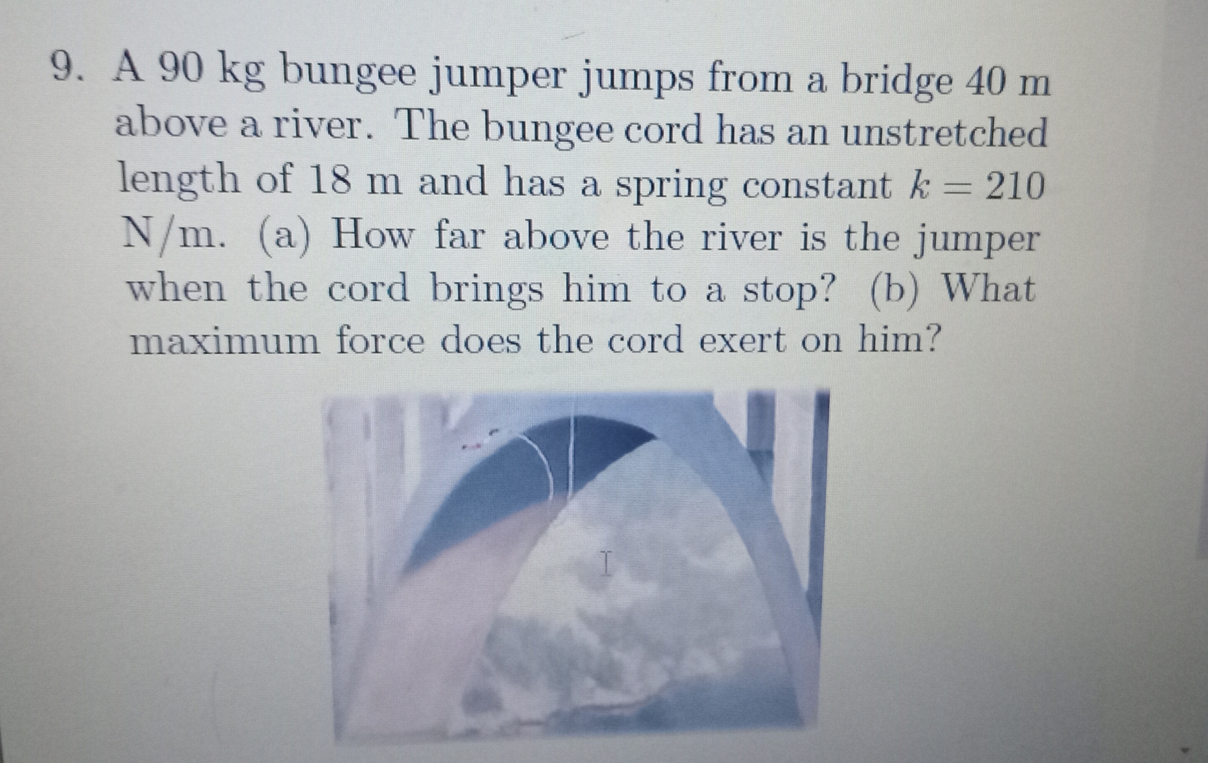 A 9 0 kg bungee jumper jumps from a bridge 4 0 m