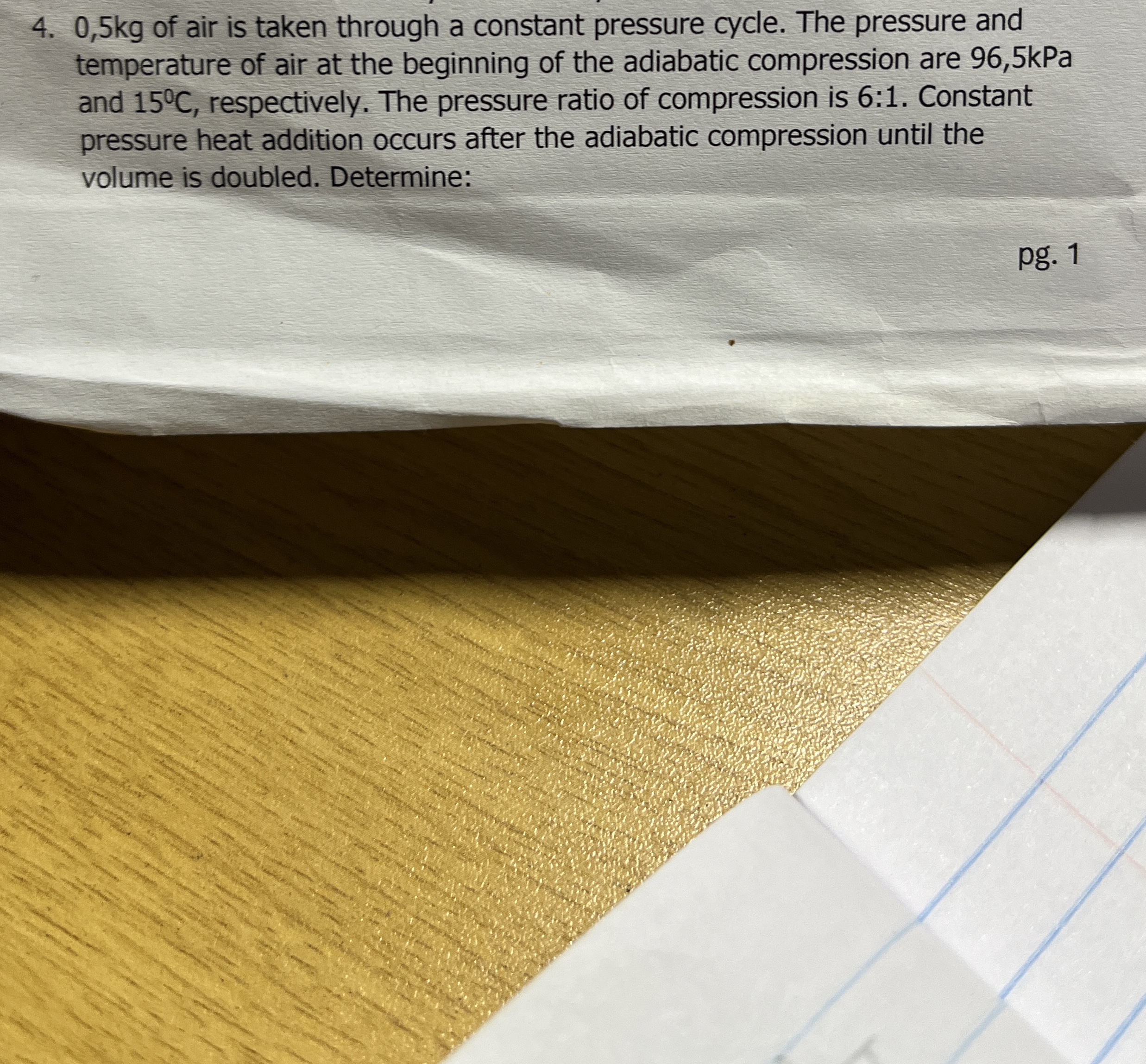 0 , 5 k g of air is taken through a constant