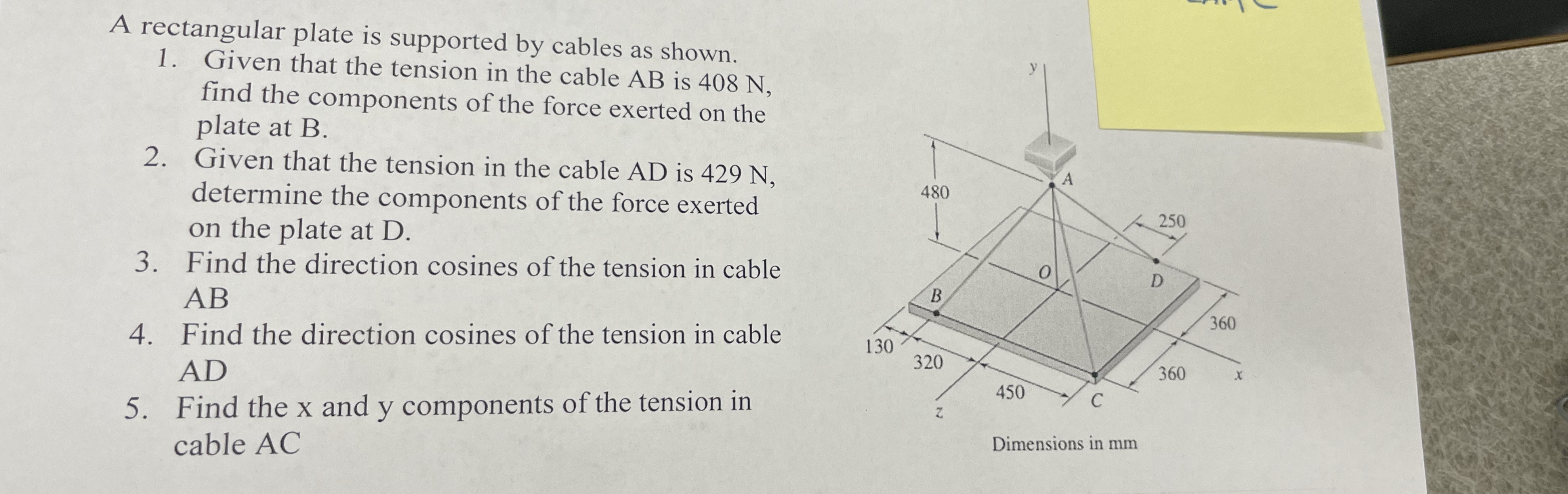 A rectangular plate is supported by cables as