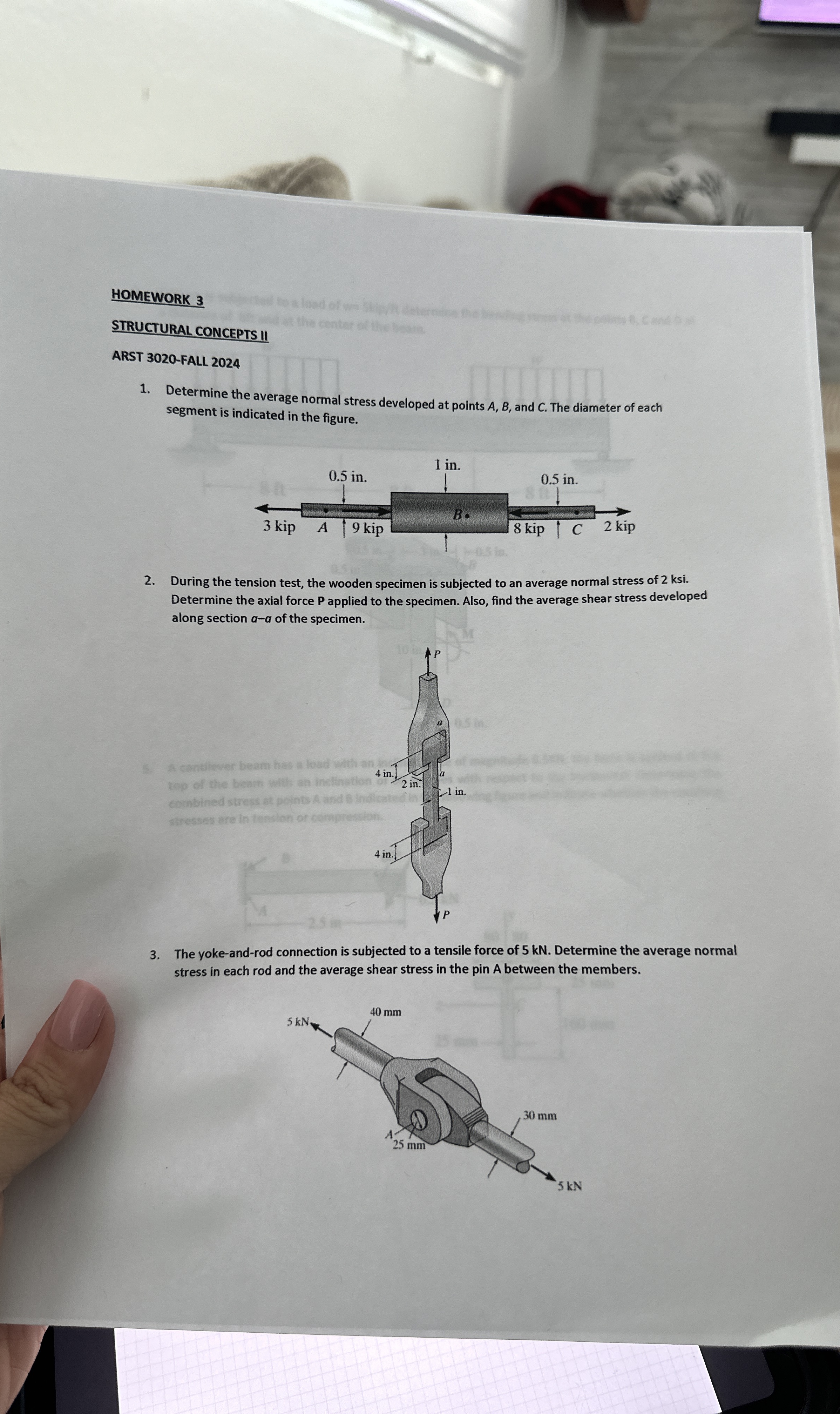 1 . Determine the average normal stress developed