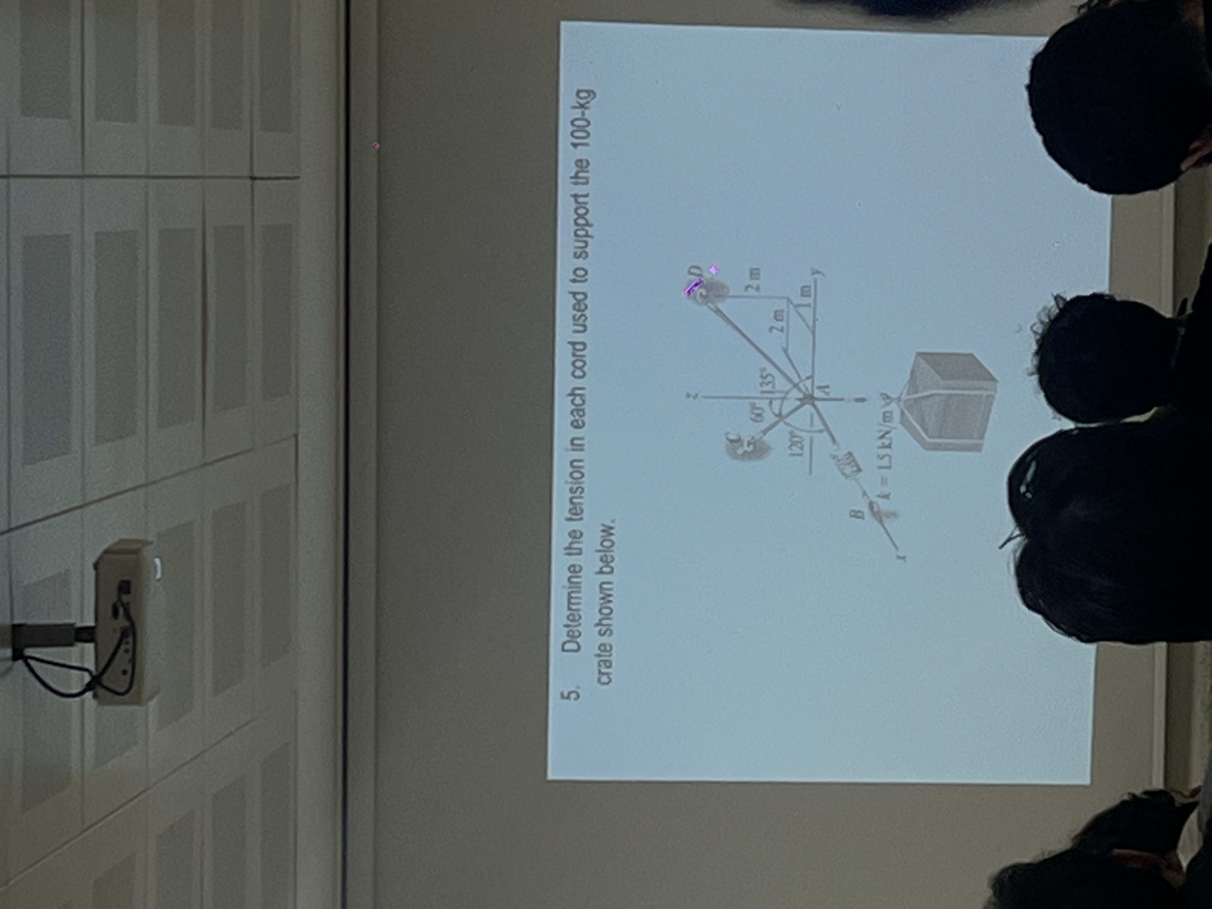 Determine the tension in each cord used to