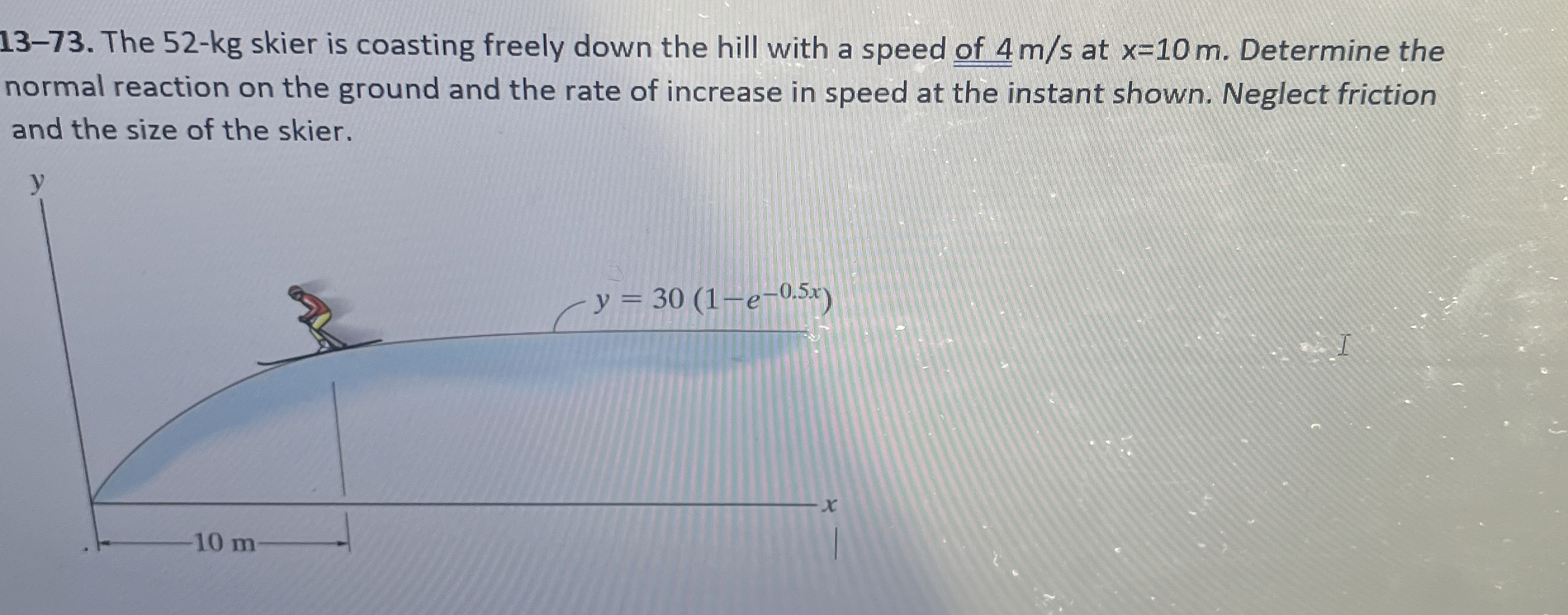 1 3 - 7 3 . The 5 2 - kg skier is coasting freely