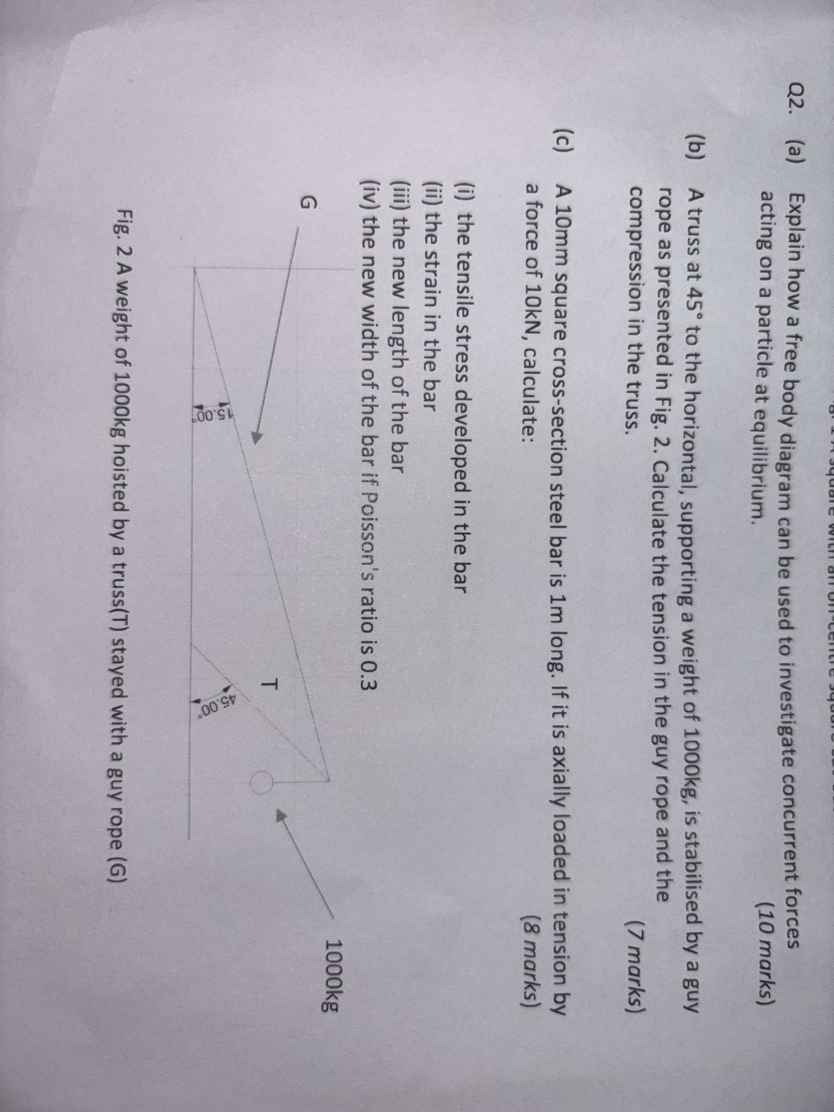 Q 2 . ( a ) Explain how a free body diagram can