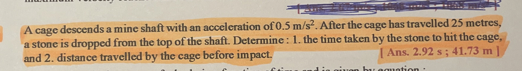 A cage descends a mine shaft with an acceleration