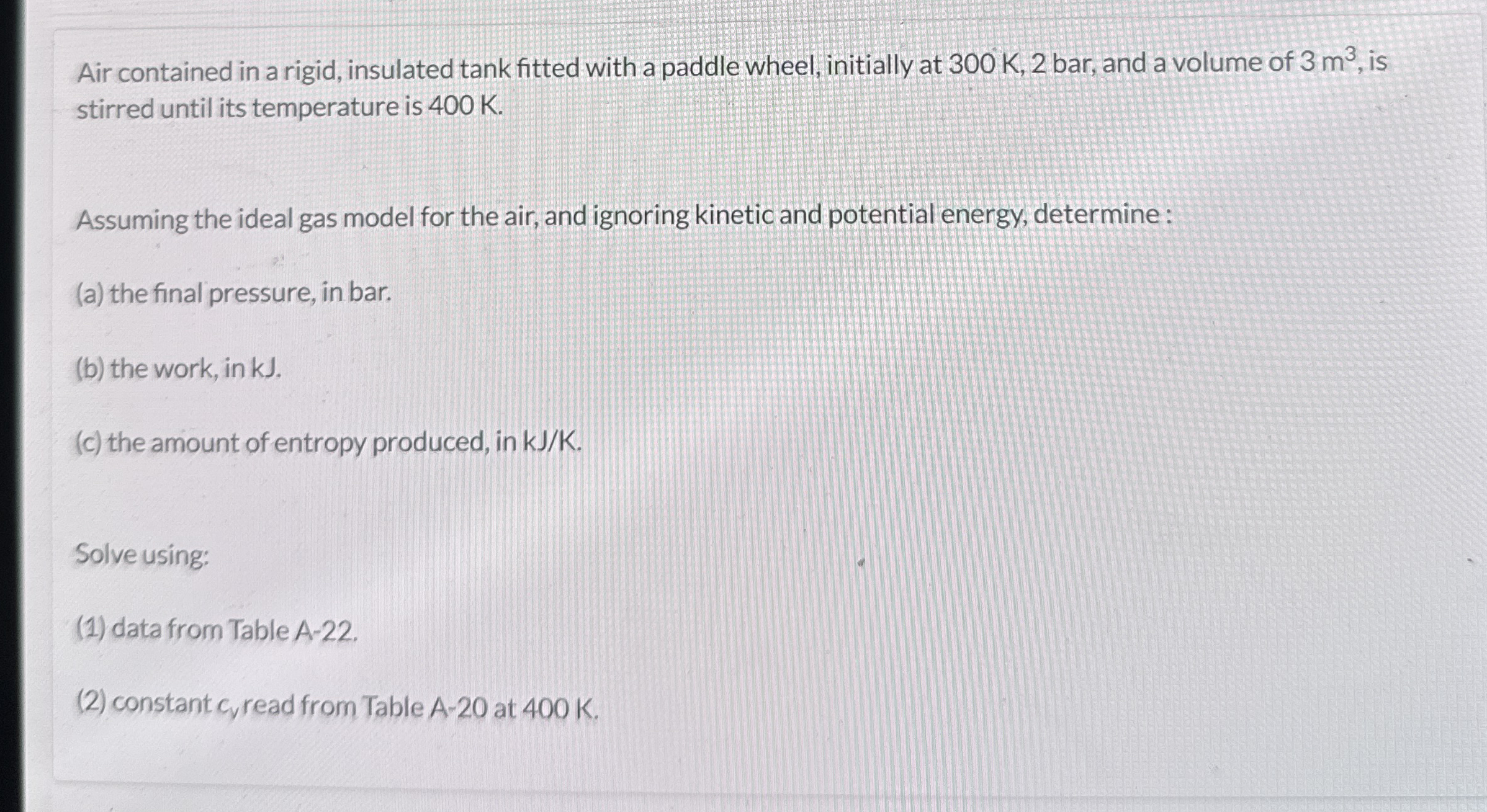 Air contained in a rigid, insulated tank fitted