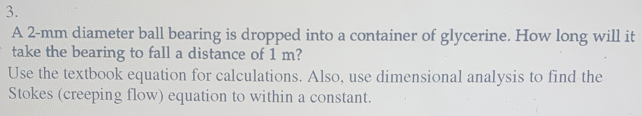 A 2 - mm diameter ball bearing is dropped into a