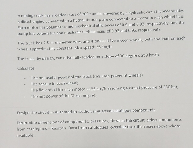 A mining truck has a loaded mass of 2 0 0 t and