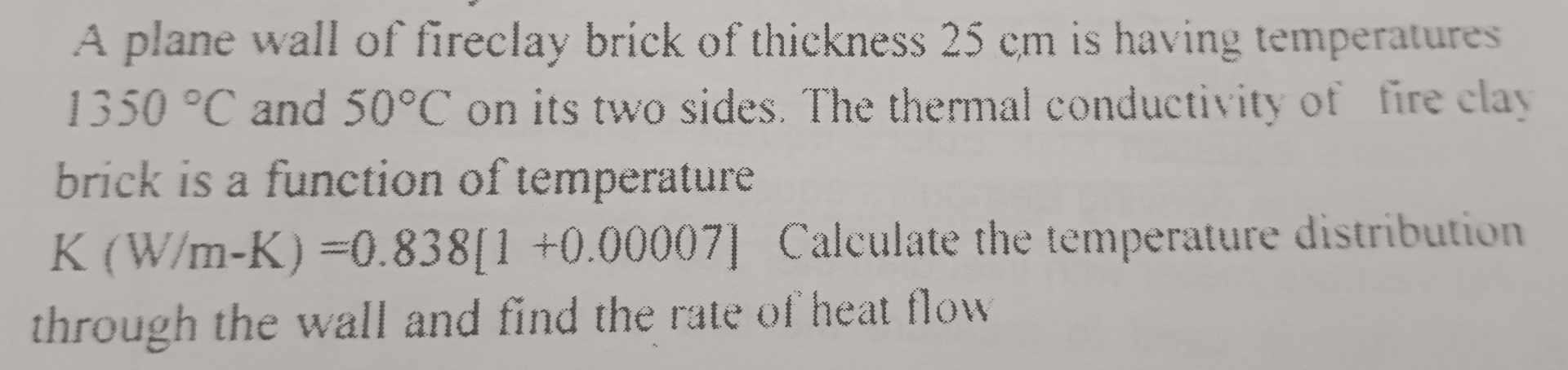A plane wall of fireclay brick of thickness 2 5