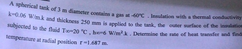 A spherical tank of 3 m diameter contains a gas