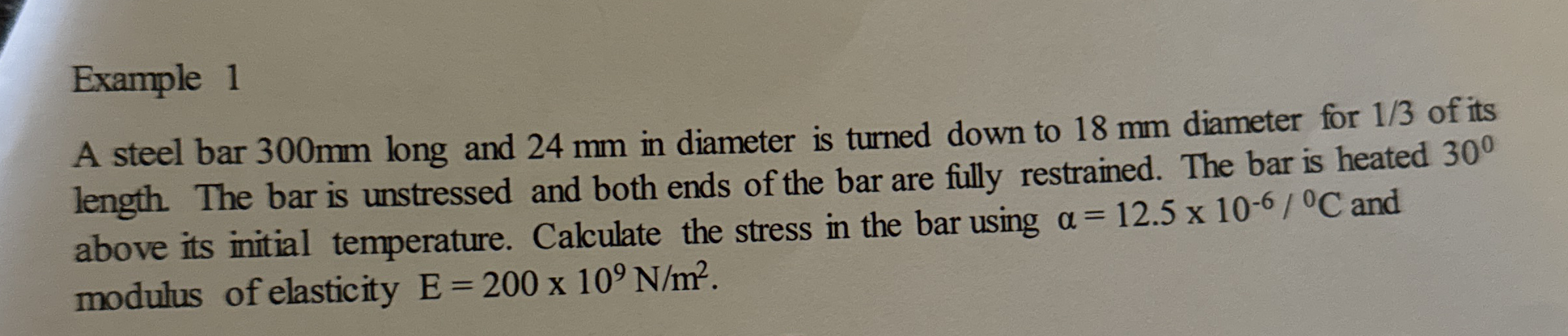 Example 1 A steel bar 3 0 0 mm long and 2 4 mm in