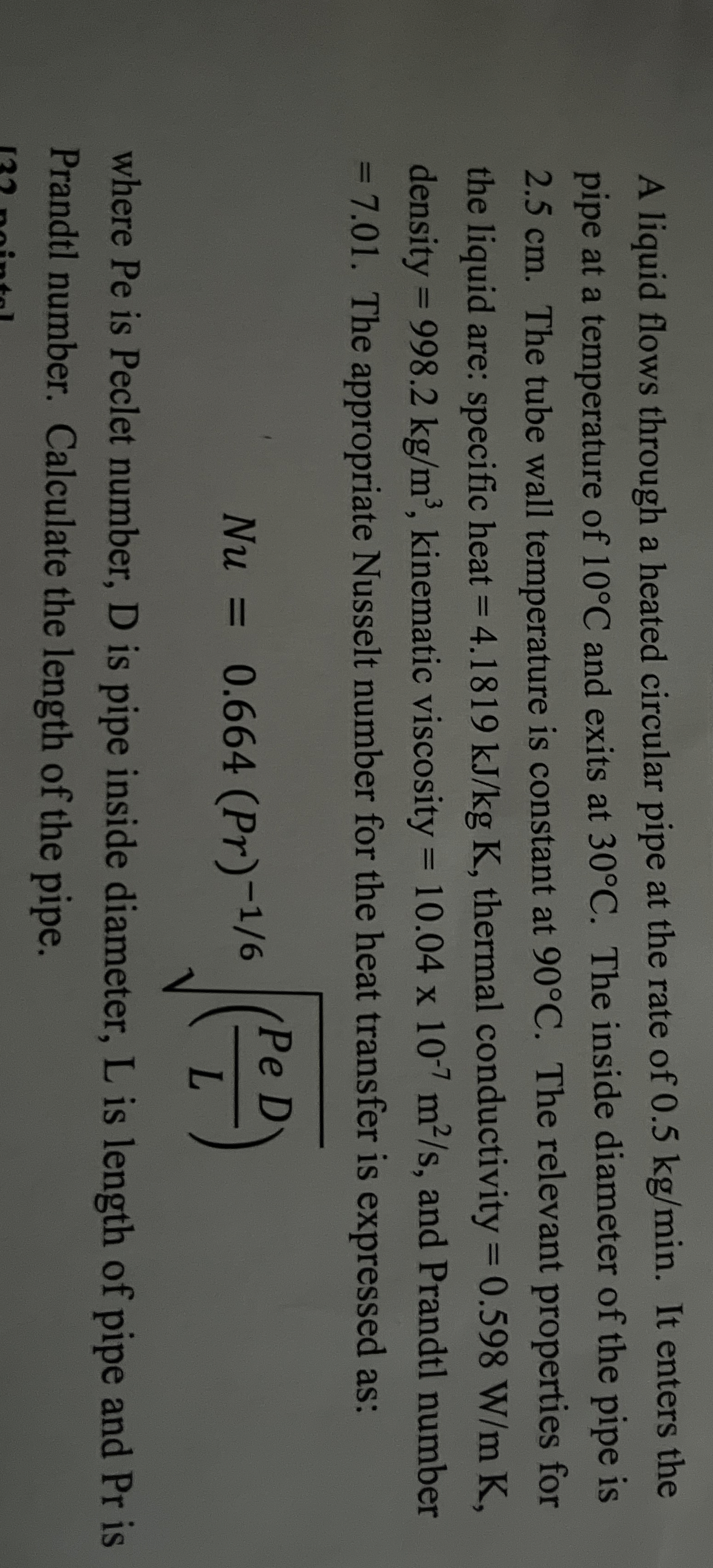 A liquid flows through a heated circular pipe at