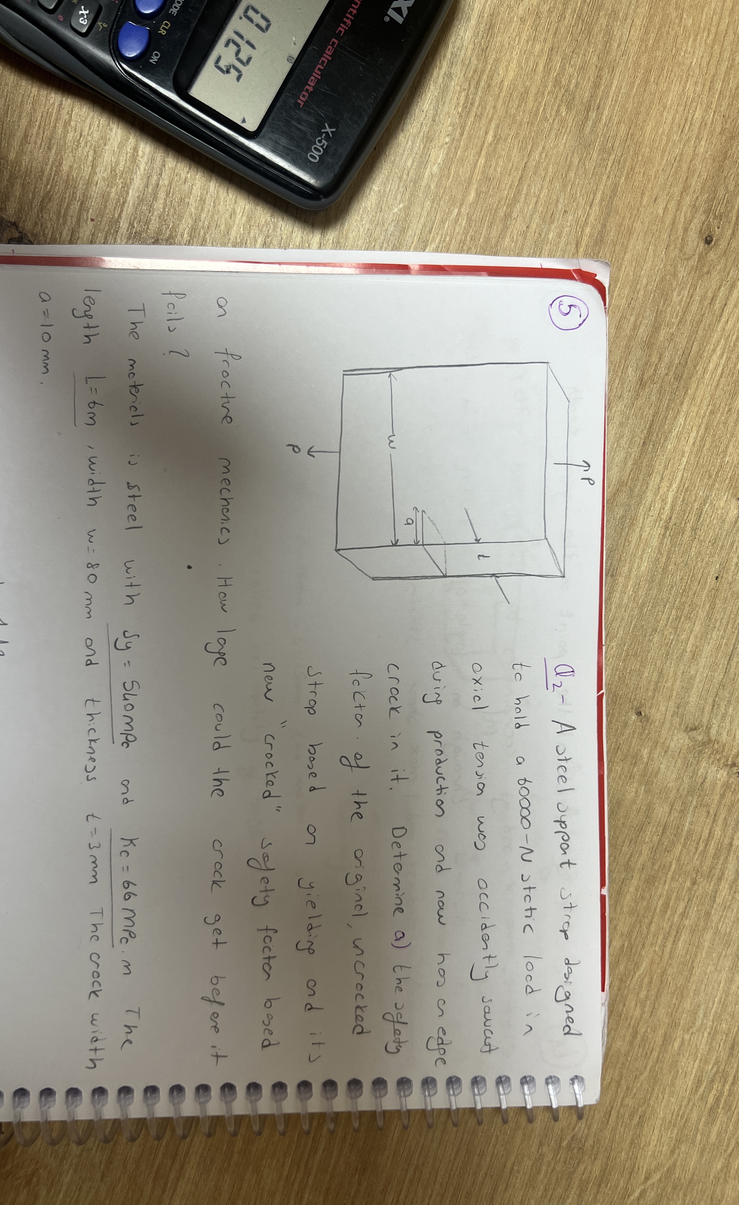 Q 2 - A steel suppat strop designed to hold a b 0