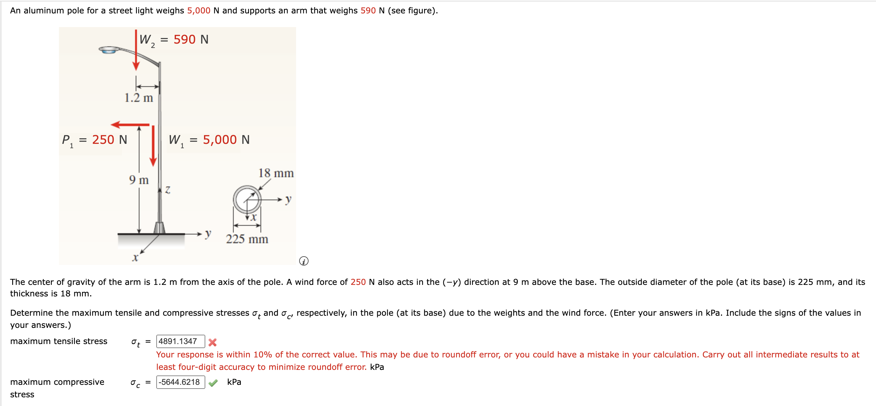 An aluminum pole for a street light weighs 5 , 0