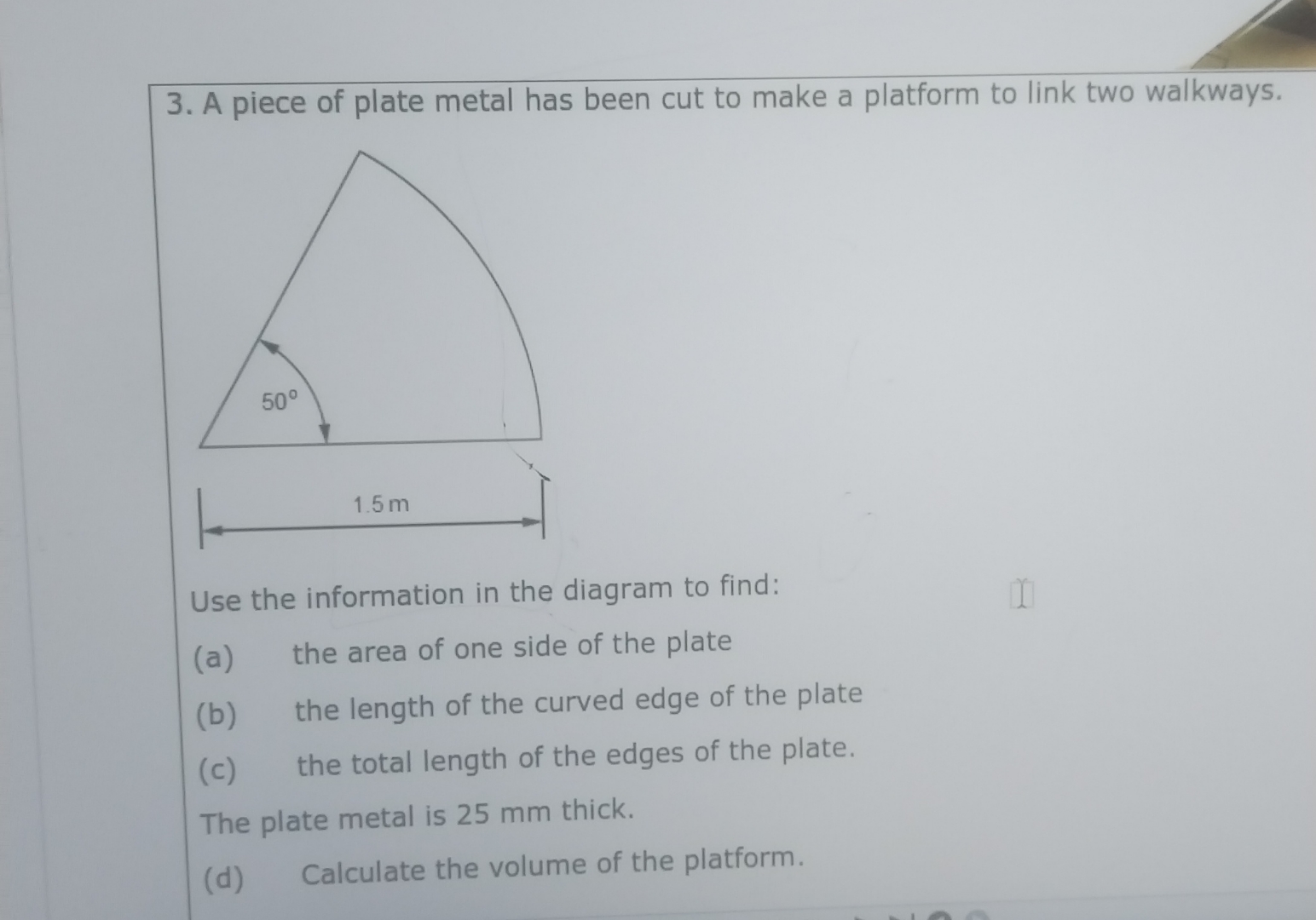 A piece of plate metal has been cut to make a