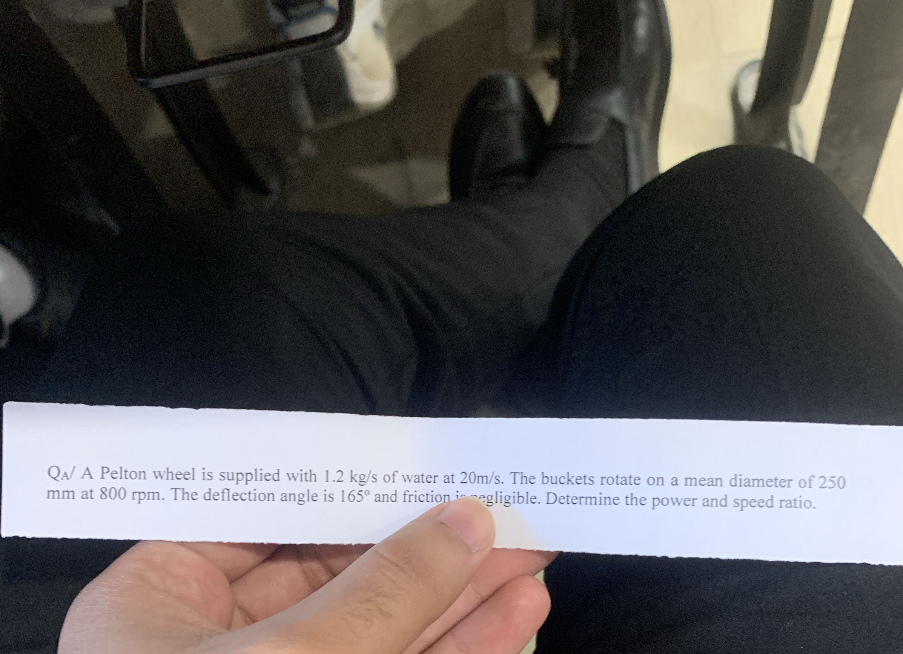 Q A ? A Pelton wheel is supplied with 1 . 2 k g s