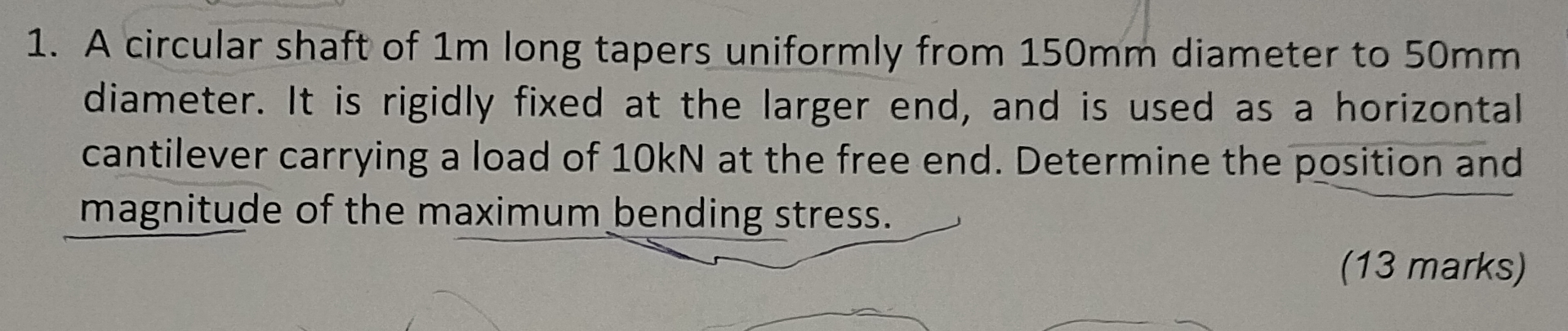 A circular shaft of 1 m long tapers uniformly