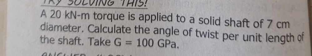 A 2 0 k N - m torque is applied to a solid shaft