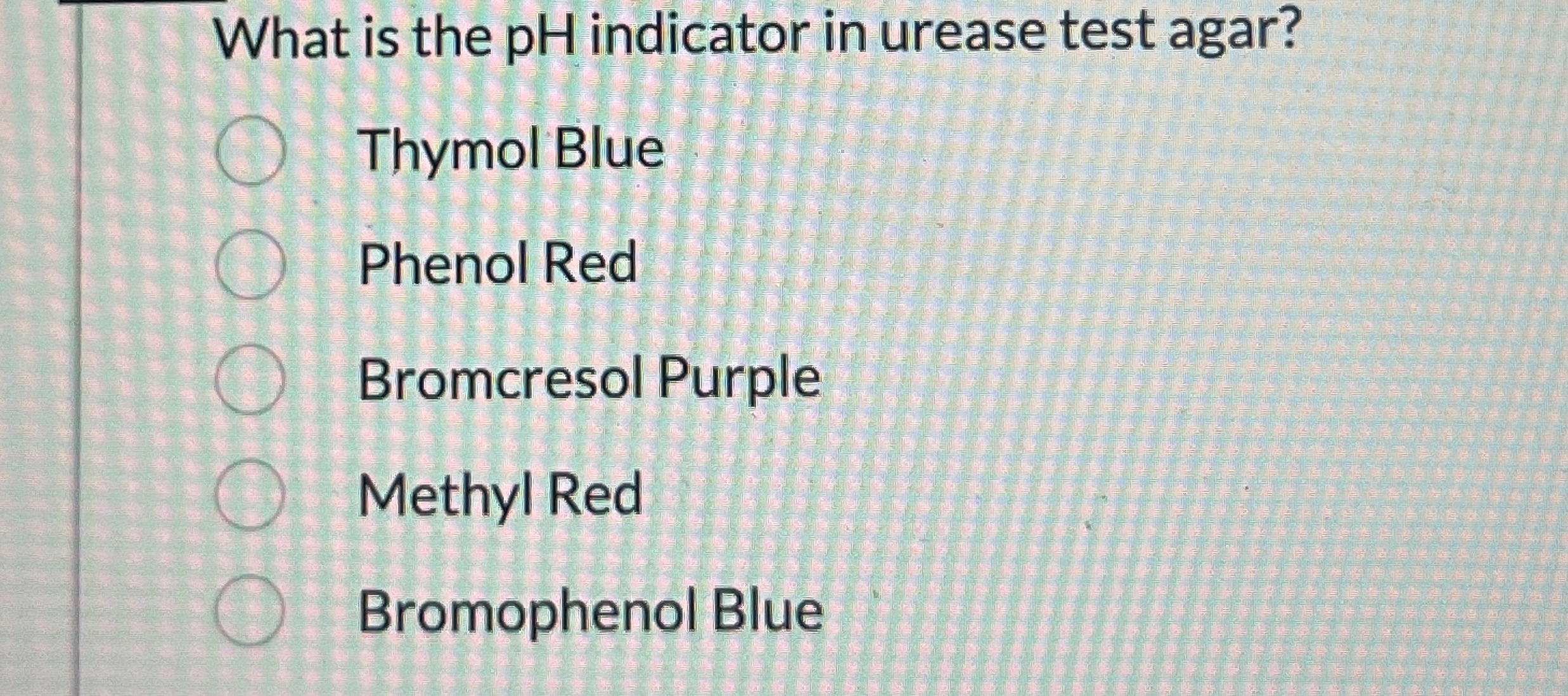 What is the pH indicator in urease test agar?