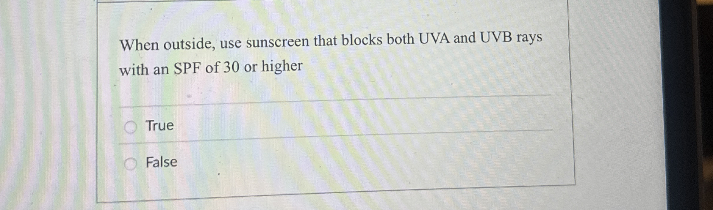 When outside, use sunscreen that blocks both UVA