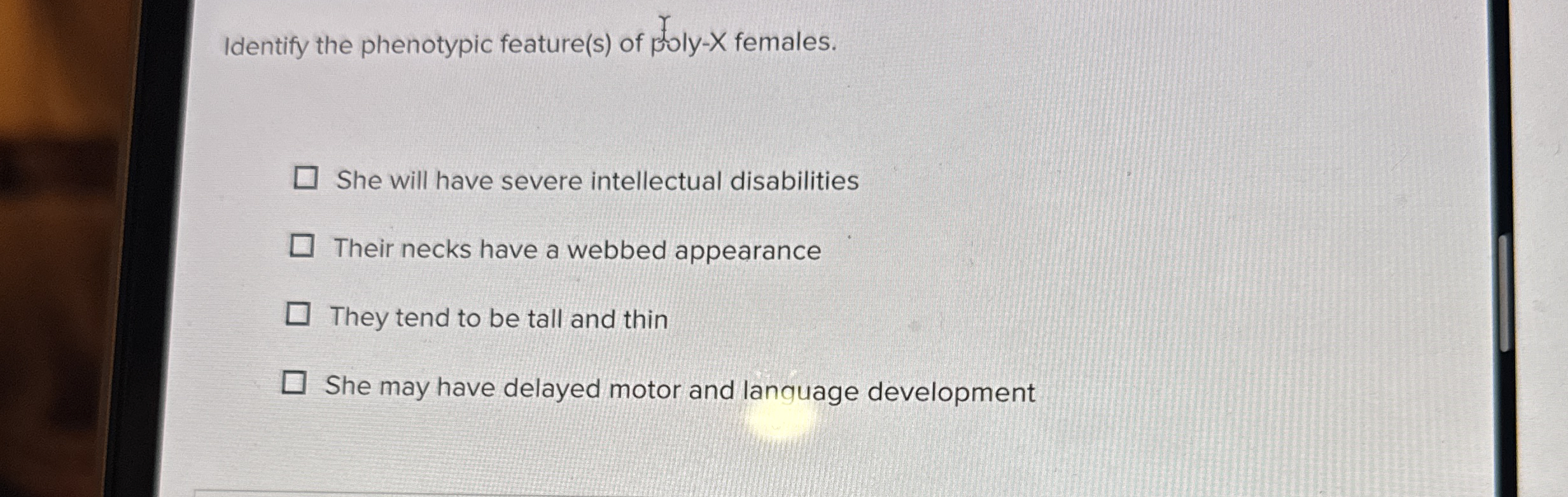 Identify the phenotypic feature ( s ) of poly - X