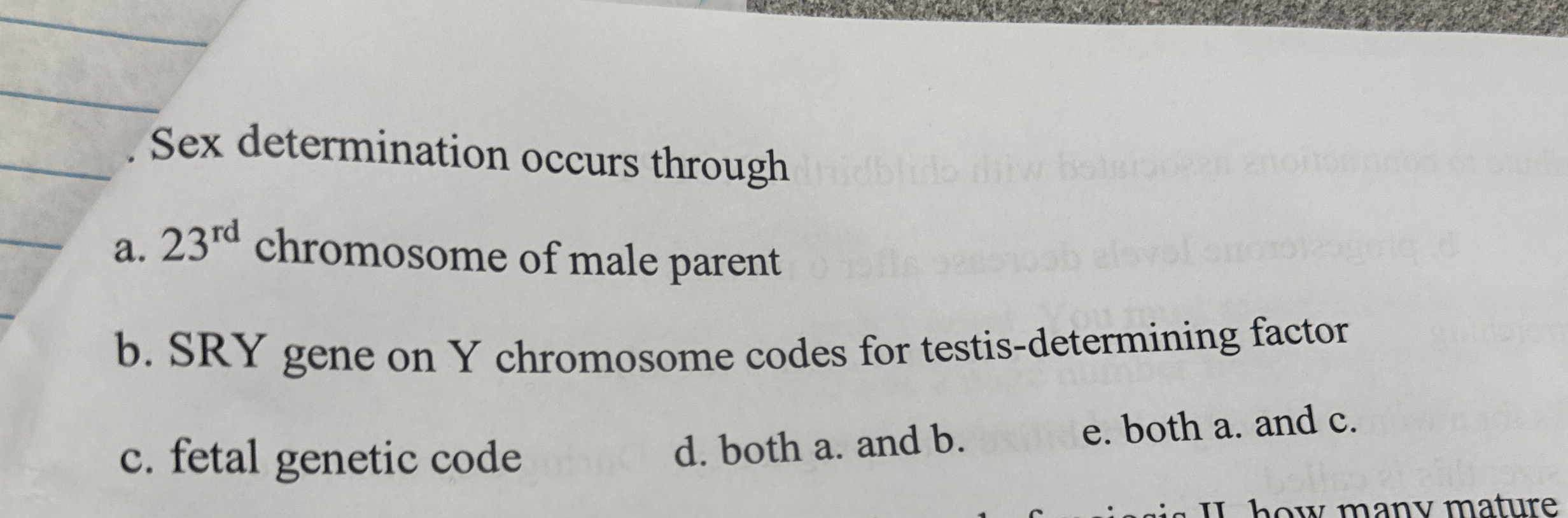 q , Sex determination occurs through a . 2 3 r d