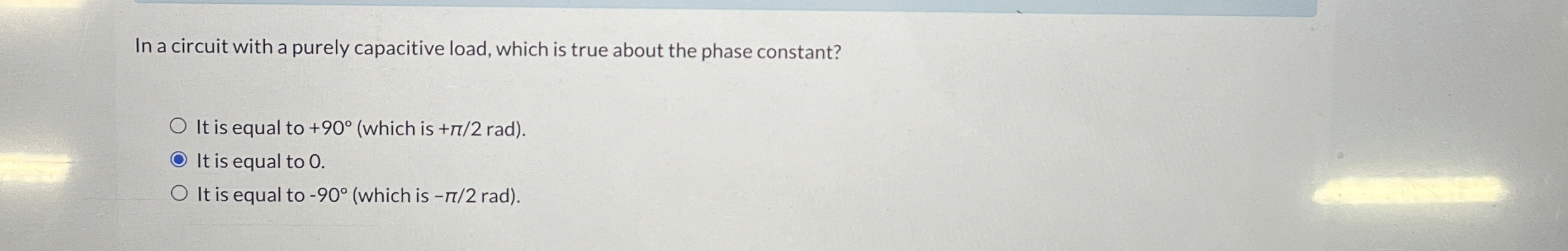 In a circuit with a purely capacitive load, which