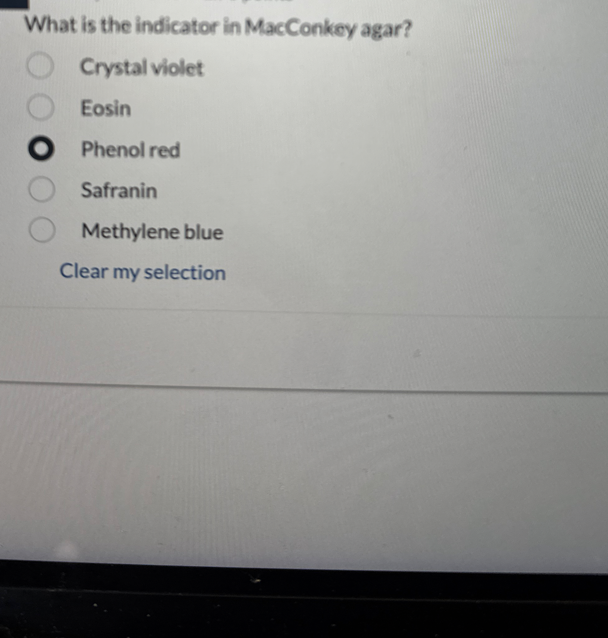 What is the indicator in MacConkey agar? Crystal