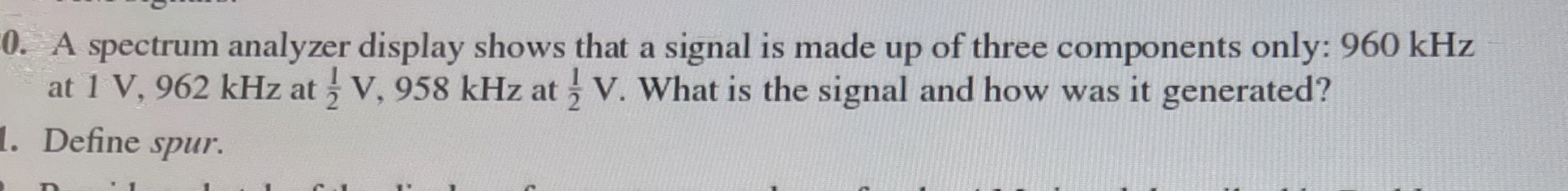 A spectrum analyzer display shows that a signal