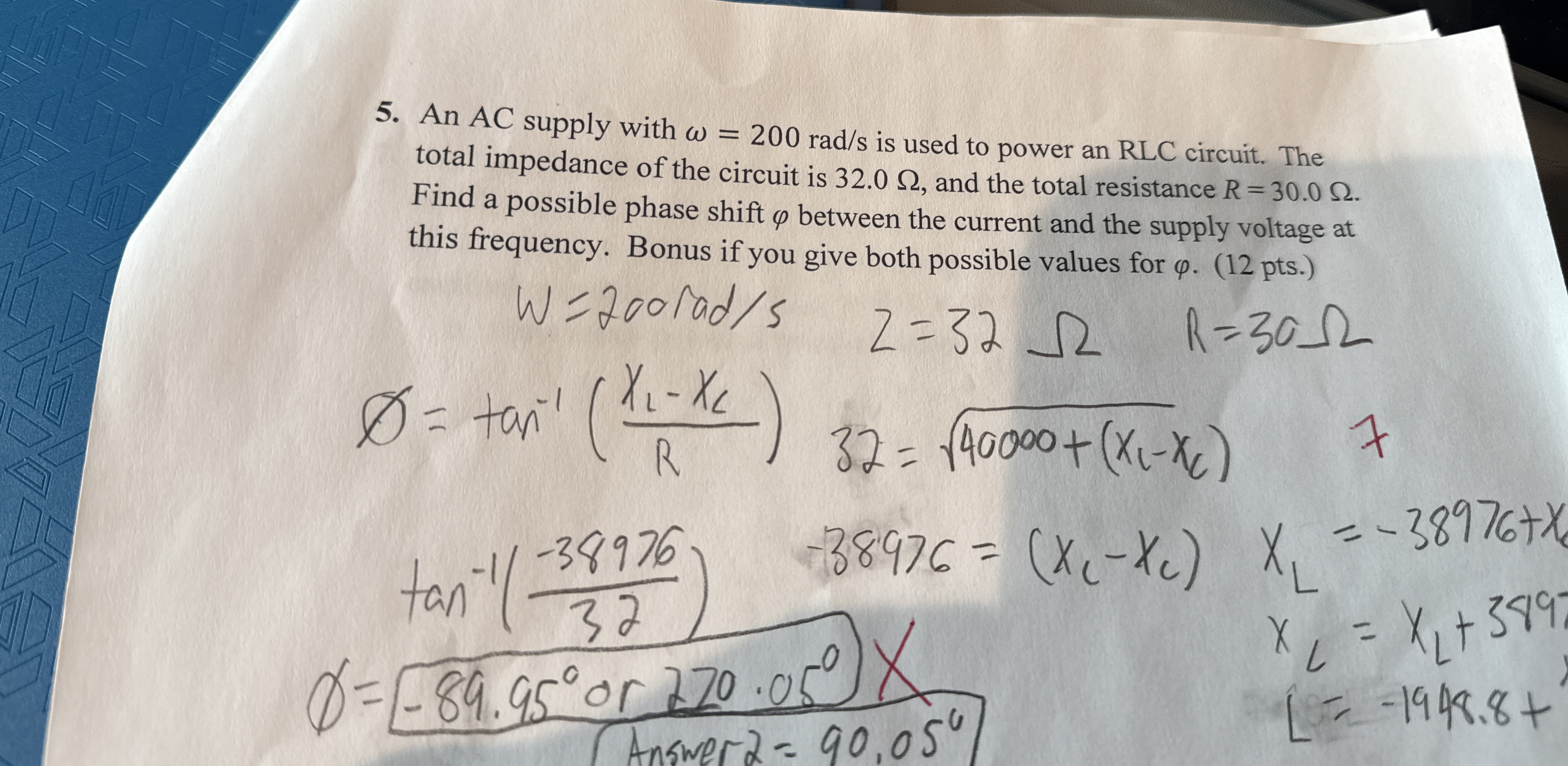 An AC supply with = 2 0 0 r a d s is used to