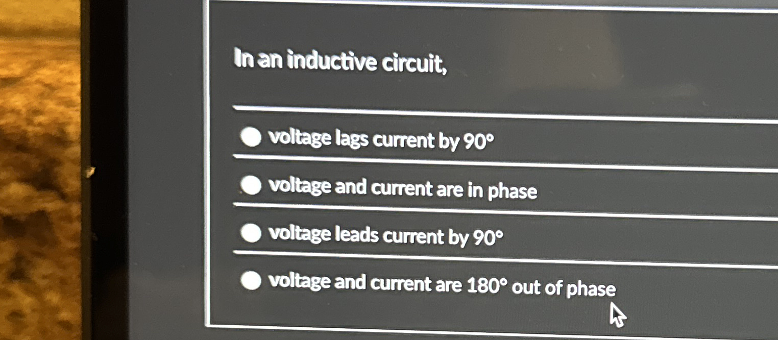 In an inductive circuit, q , voltage lags current