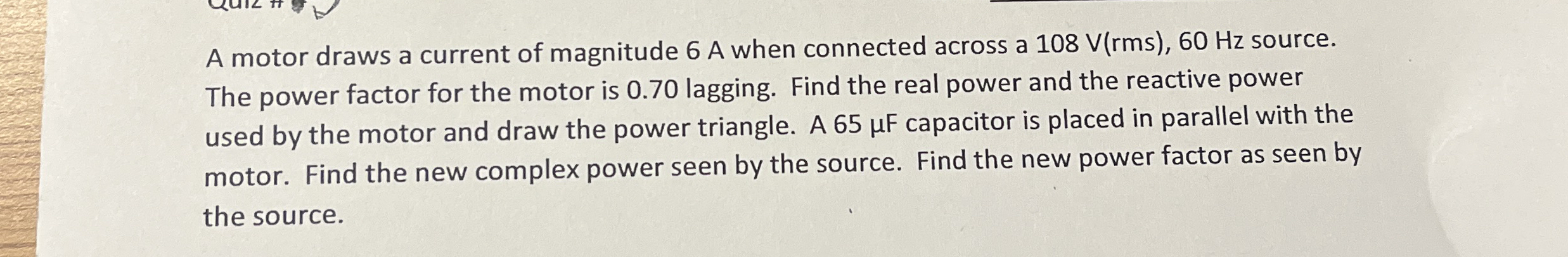 A motor draws a current of magnitude 6 A when