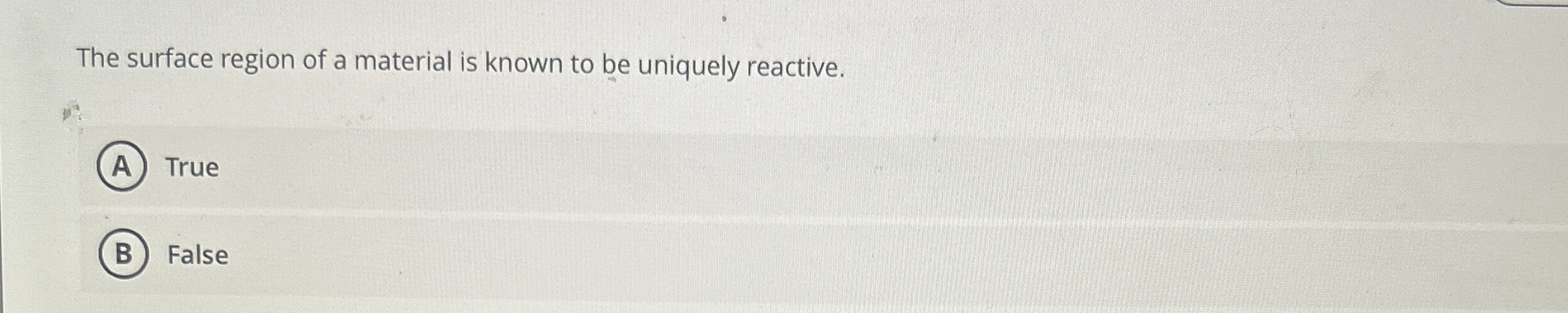 The surface region of a material is known to be