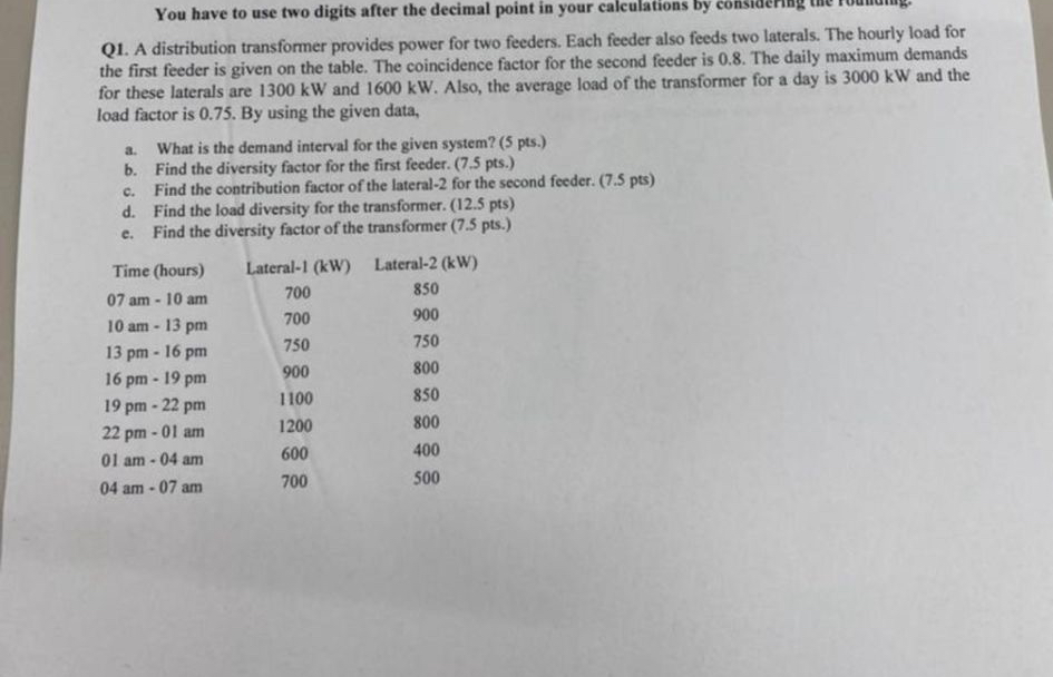 Q 1 . A distribution transformer provides power
