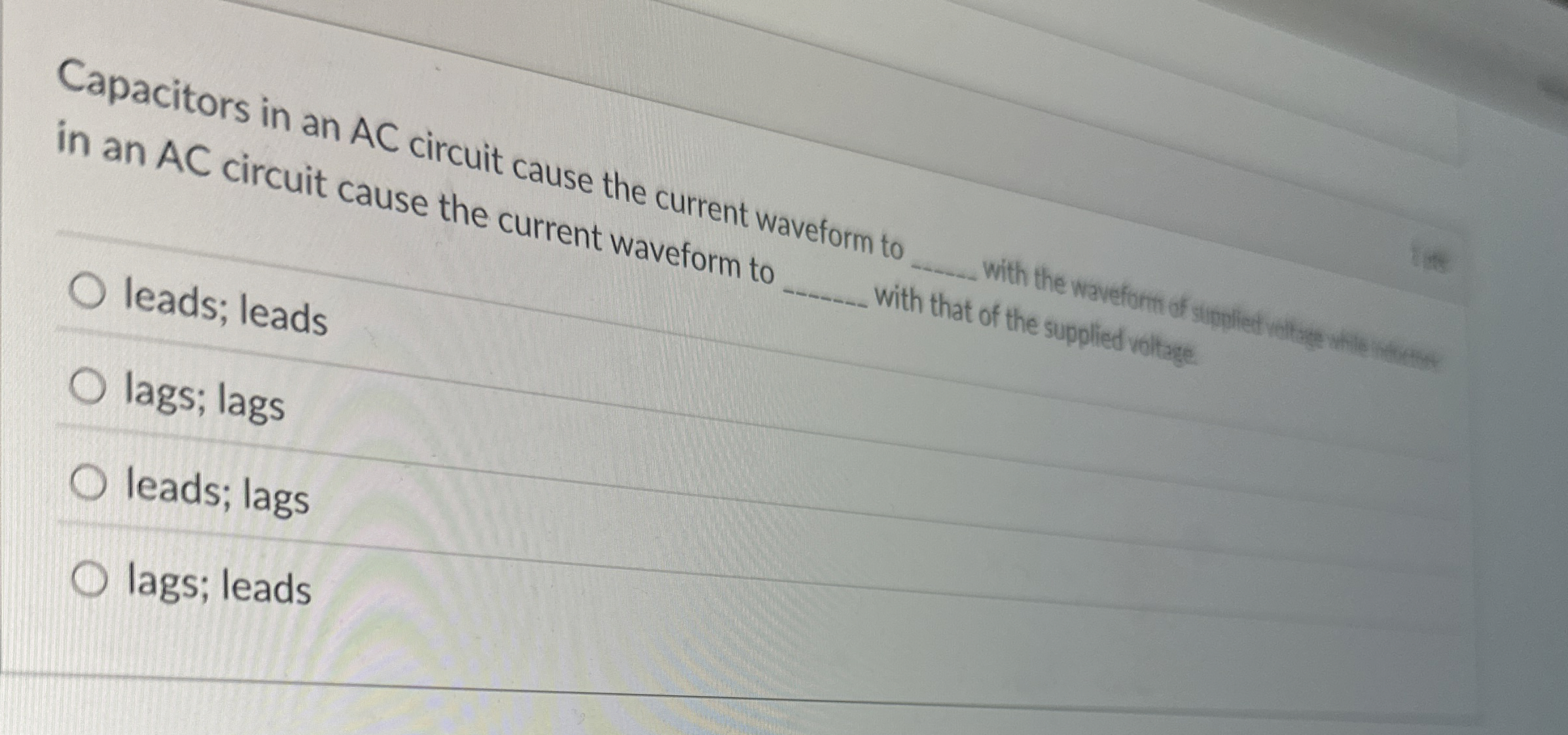 Capacitors in an AC circuit cause the current