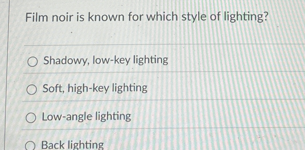 Film noir is known for which style of lighting?