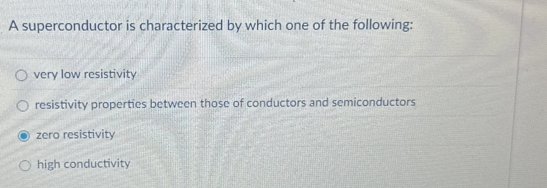 A superconductor is characterized by which one of