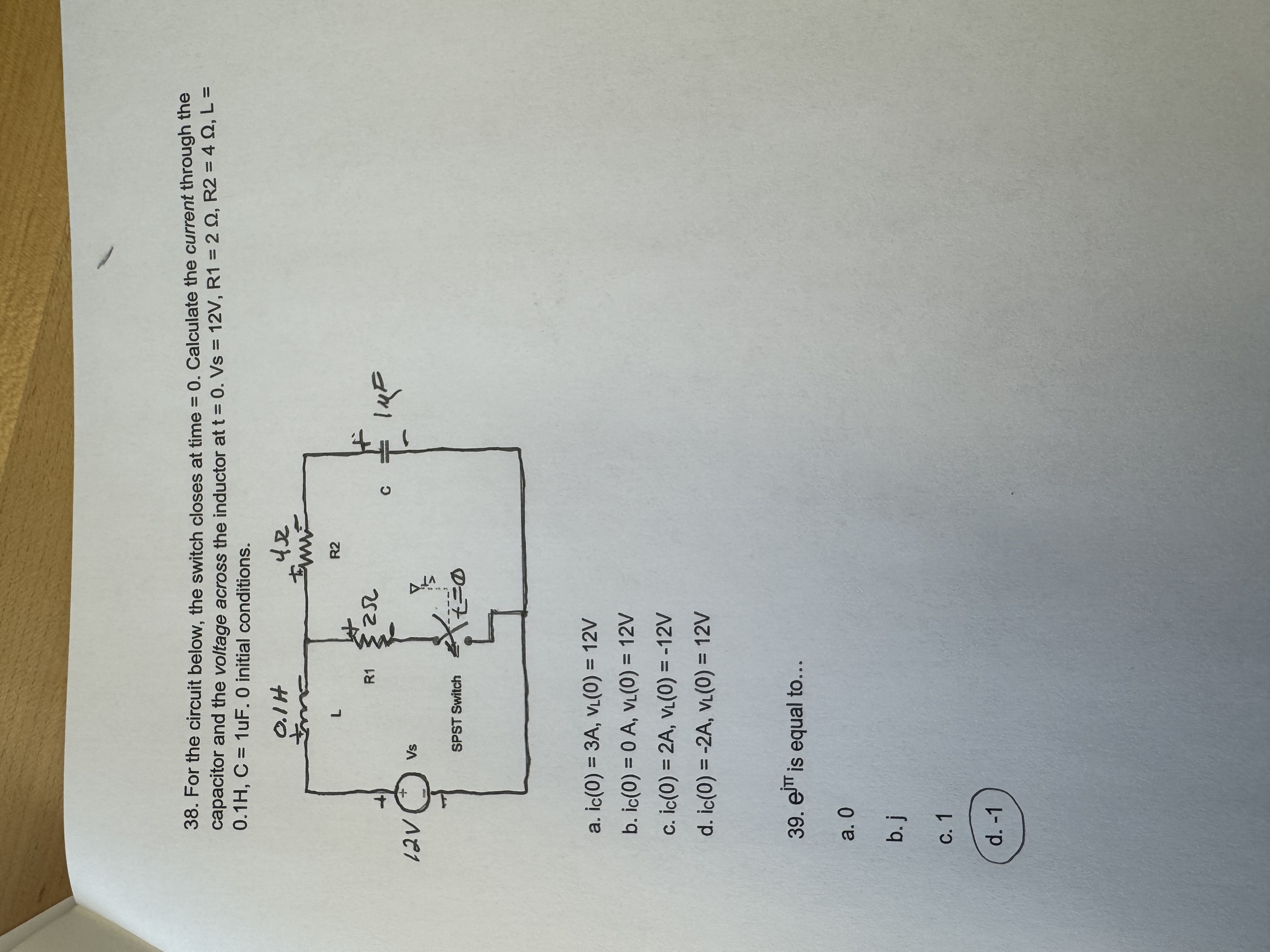 For the circuit below, the switch closes at time