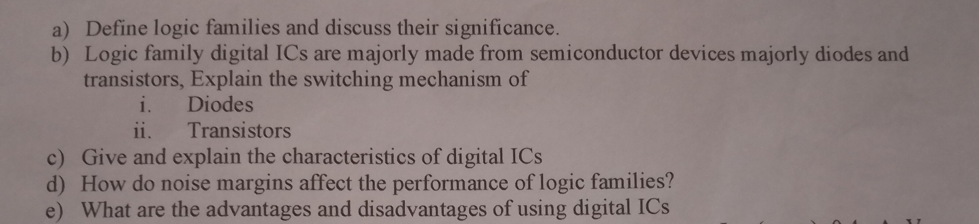 a ) Define logic families and discuss their