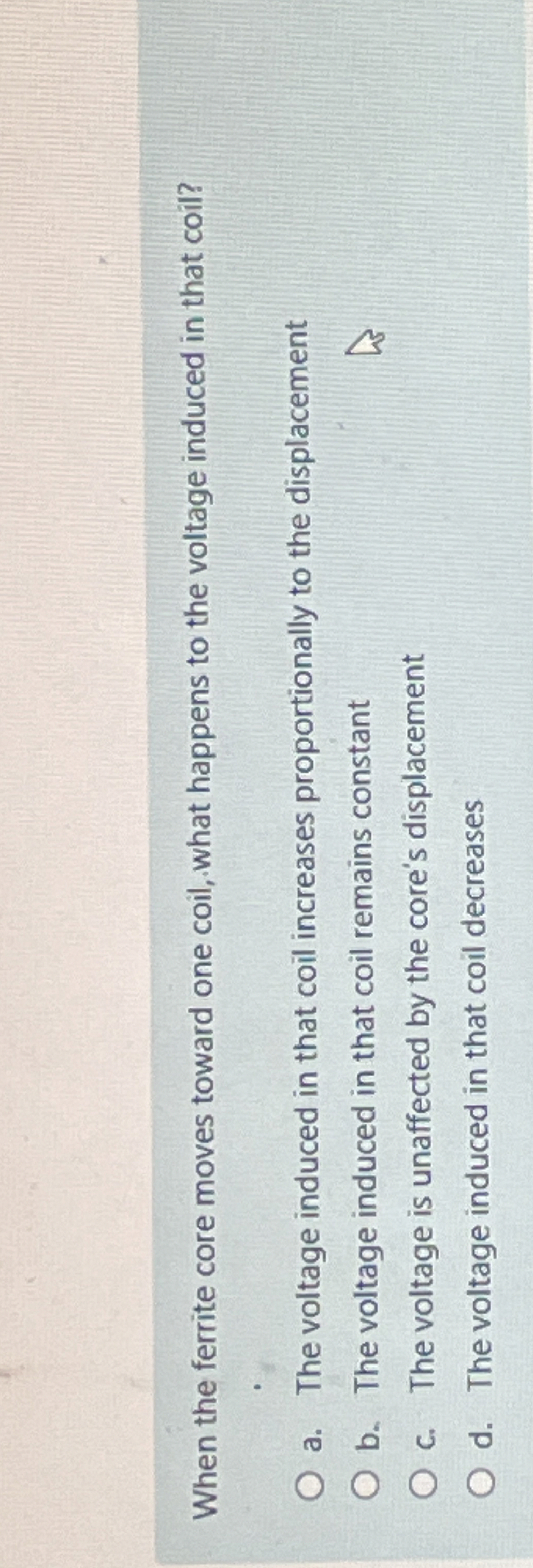 When the ferrite core moves toward one coil, what