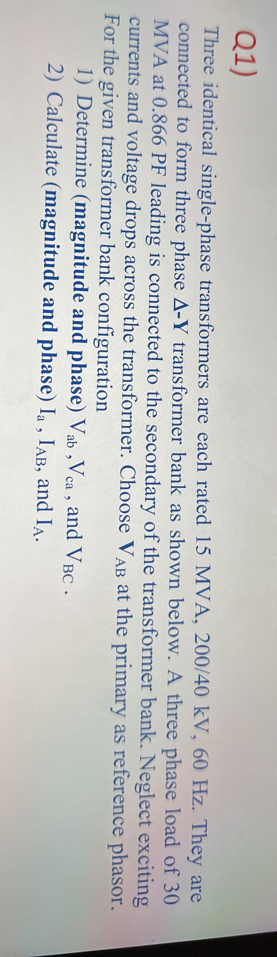 Q 1 ) Three identical single - phase transformers