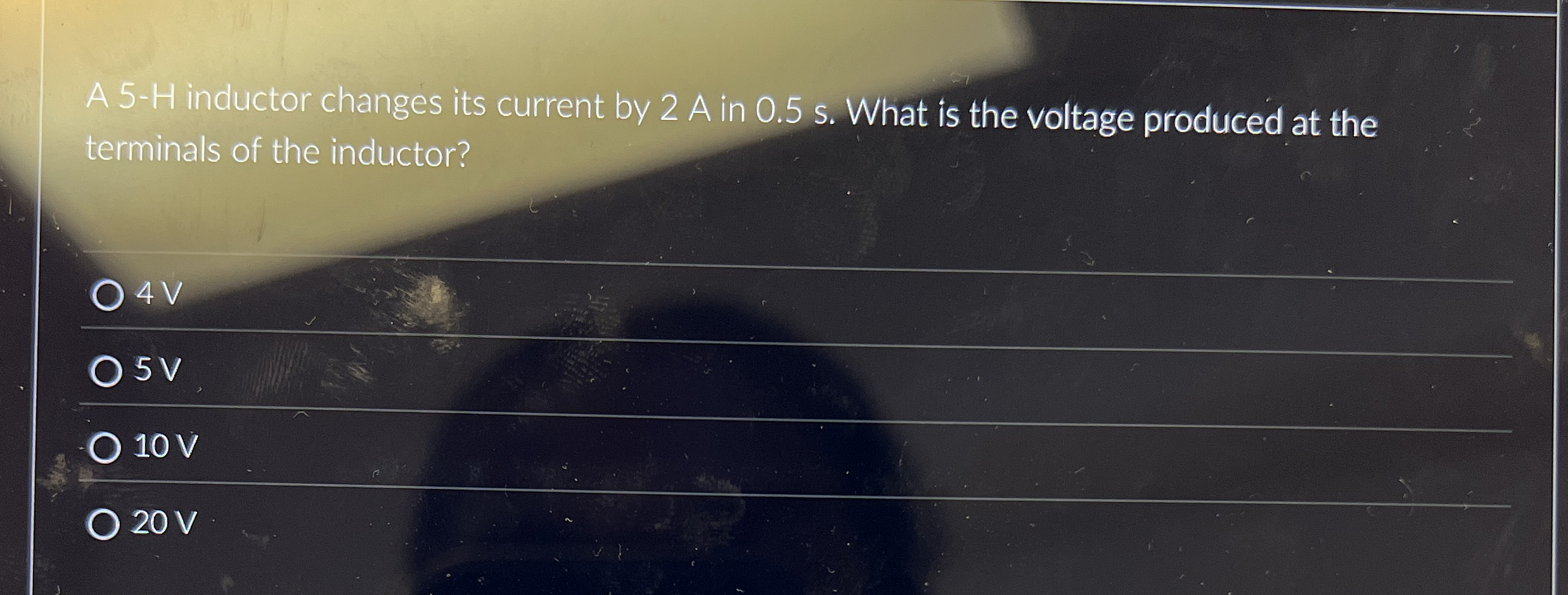 A 5 - H inductor changes its current by 2 A in 0