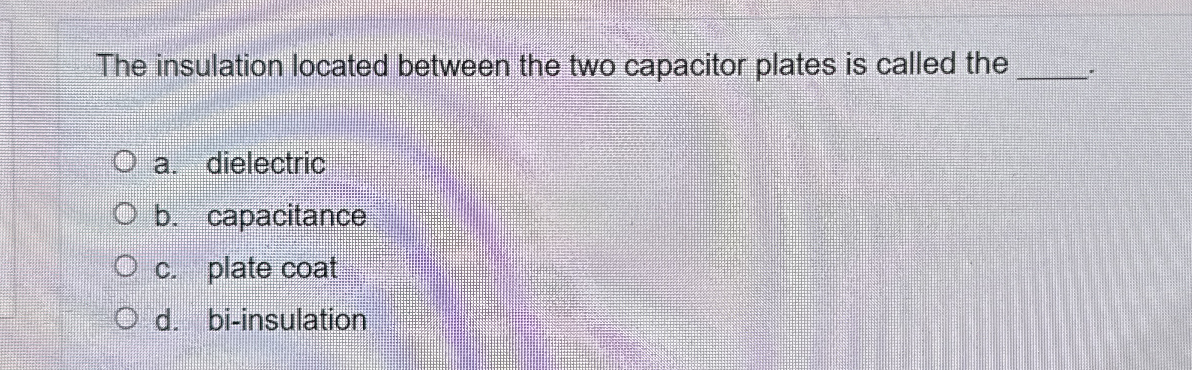 The insulation located between the two capacitor
