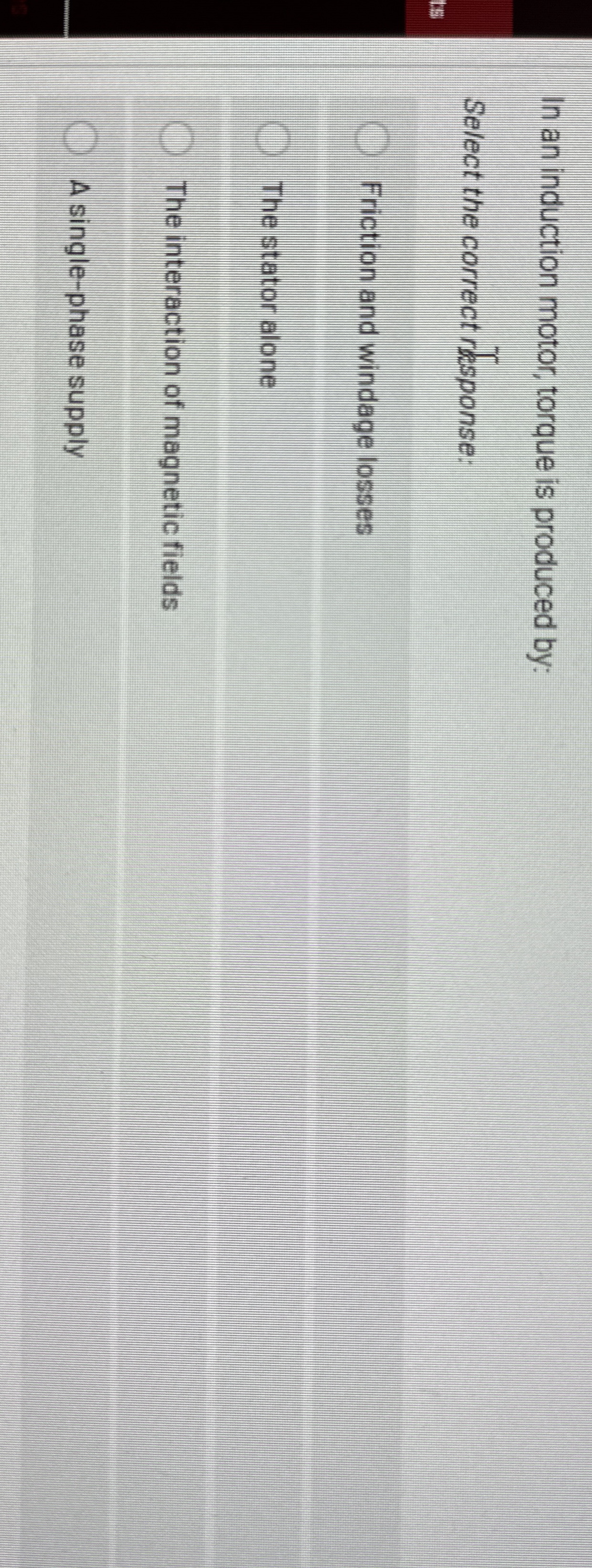 In an induction motor, torque is produced by: